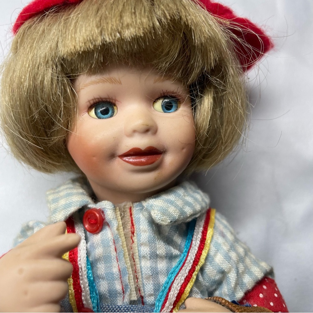 Vintage Porcelain Doll with Red and Blue Outfit - Picture 3 of 4